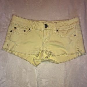 Yellow jean shorts. Stretch